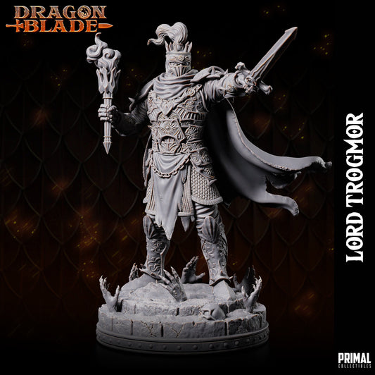 Lord Soth, a Death Knight. Wearing elaborate filigree plate armour. Holding a torch in one hand and pointing with his sword in the other. His flowing cape billows he stands amidst a base where demonic hands erupt from the floor along a lone skull.